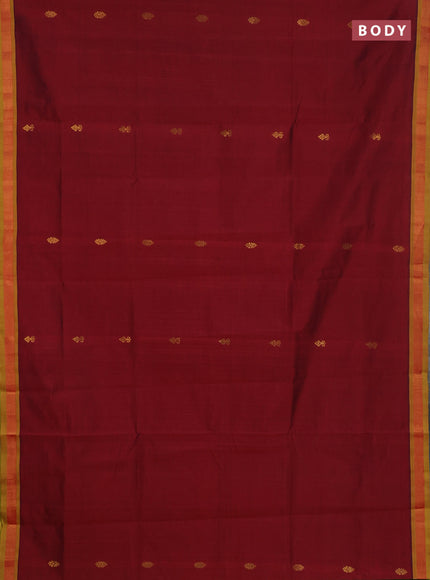 Semi silk cotton saree deep maroon and light green with zari woven buttas and zari woven border