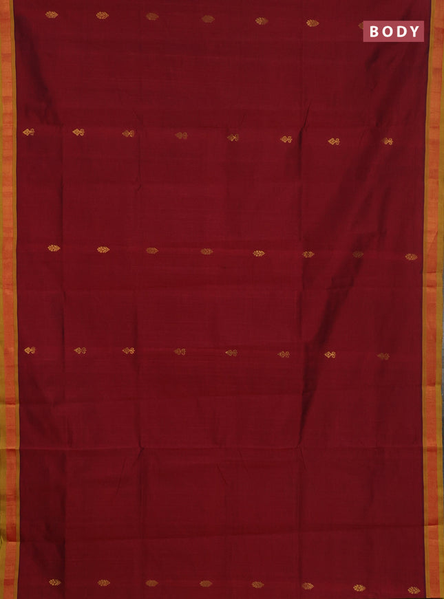 Semi silk cotton saree deep maroon and light green with zari woven buttas and zari woven border