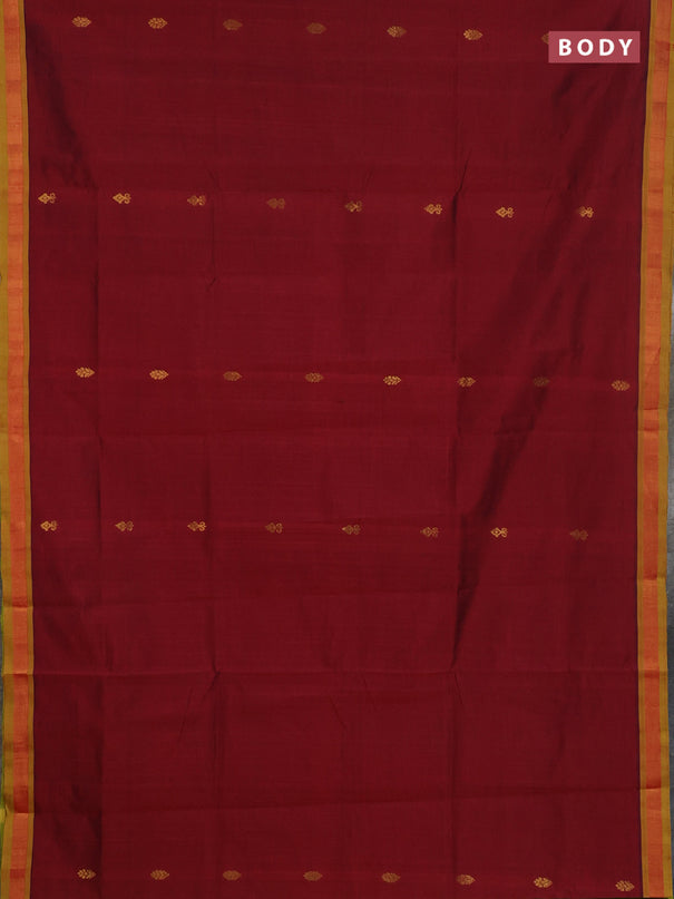 Semi silk cotton saree deep maroon and light green with zari woven buttas and zari woven border