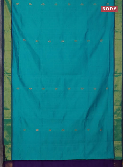 Semi silk cotton saree teal green and violet with zari woven buttas and zari woven border