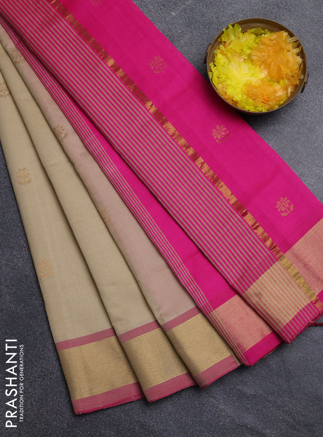 Semi silk cotton saree beige and pink with zari woven buttas and zari woven border