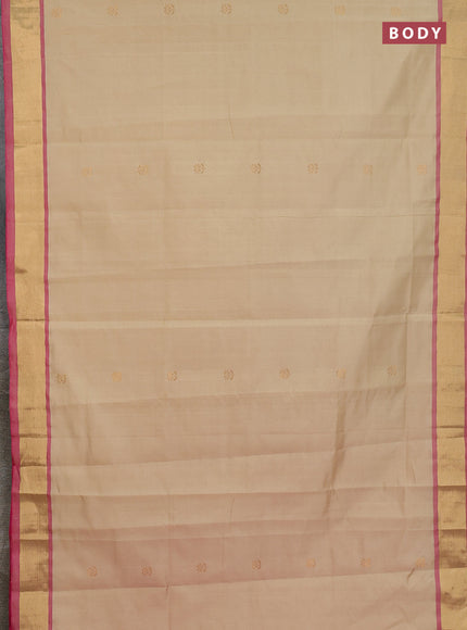 Semi silk cotton saree beige and pink with zari woven buttas and zari woven border