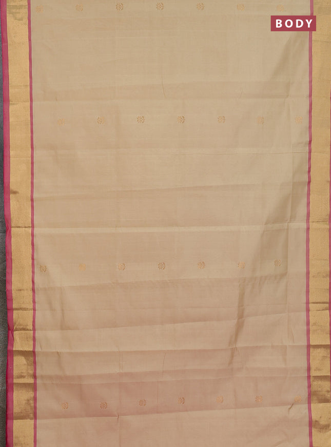 Semi silk cotton saree beige and pink with zari woven buttas and zari woven border