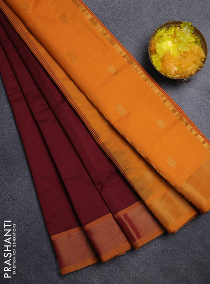 Semi silk cotton saree dark maroon and dark mustard with allover zari woven buttas and zari woven border