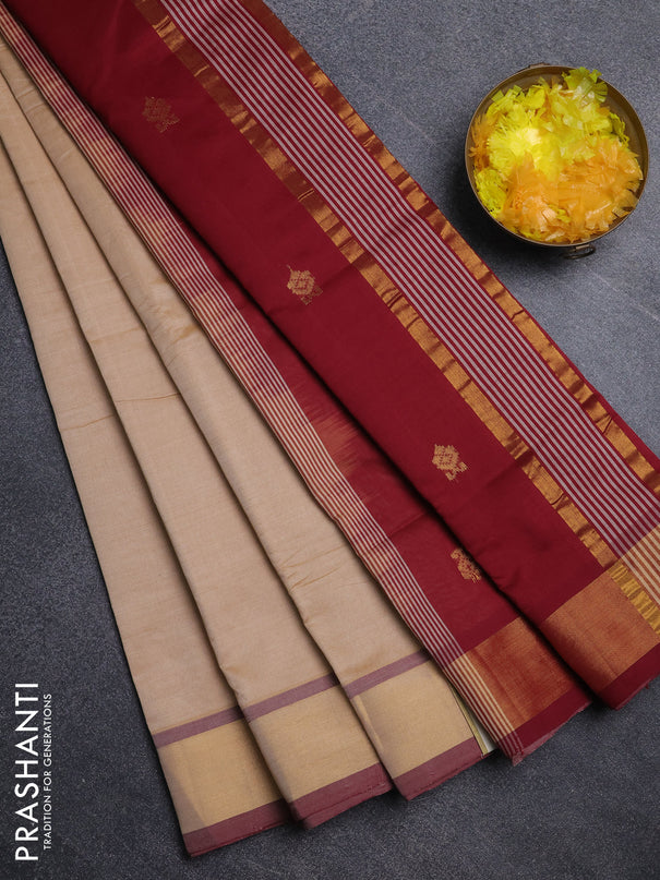 Semi silk cotton saree sandal and maroon with allover zari woven buttas and zari woven border