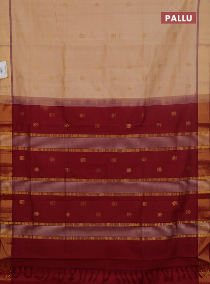 Semi silk cotton saree sandal and maroon with allover zari woven buttas and zari woven border
