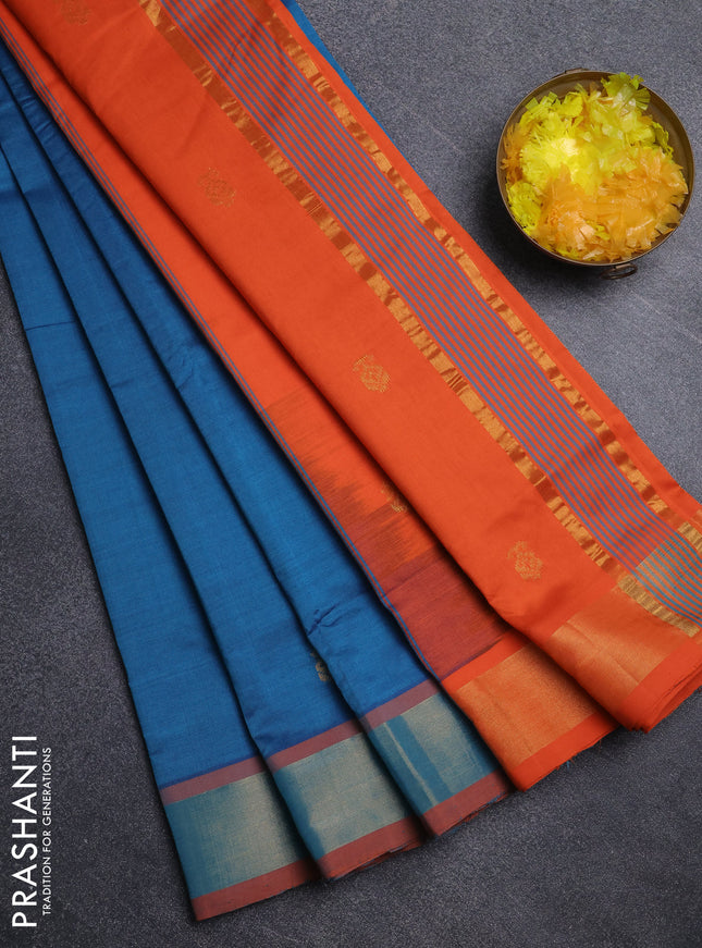 Semi silk cotton saree peacock blue and orange with allover zari woven buttas and zari woven border