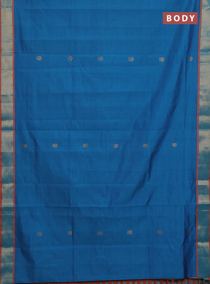 Semi silk cotton saree peacock blue and orange with allover zari woven buttas and zari woven border