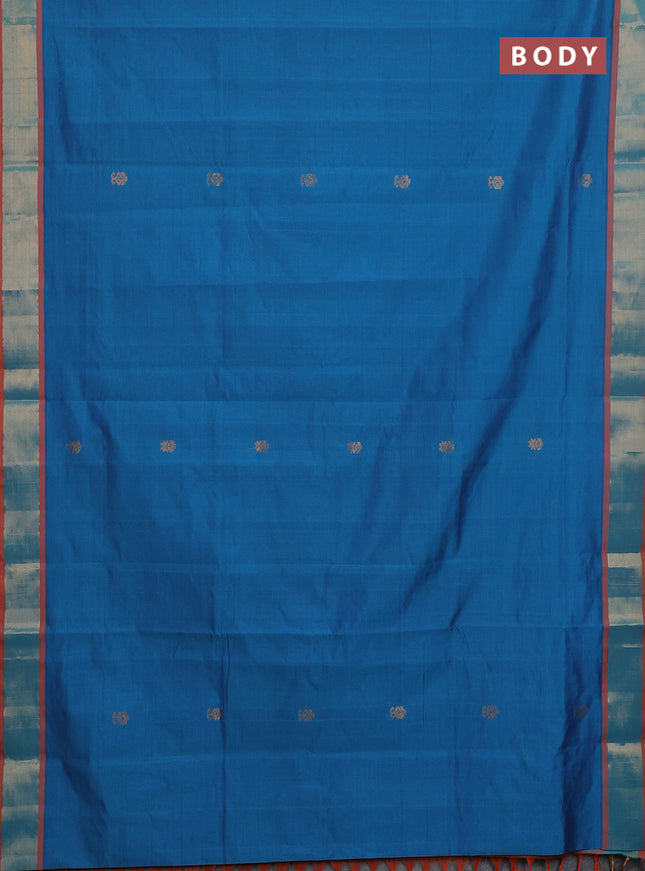 Semi silk cotton saree peacock blue and orange with allover zari woven buttas and zari woven border
