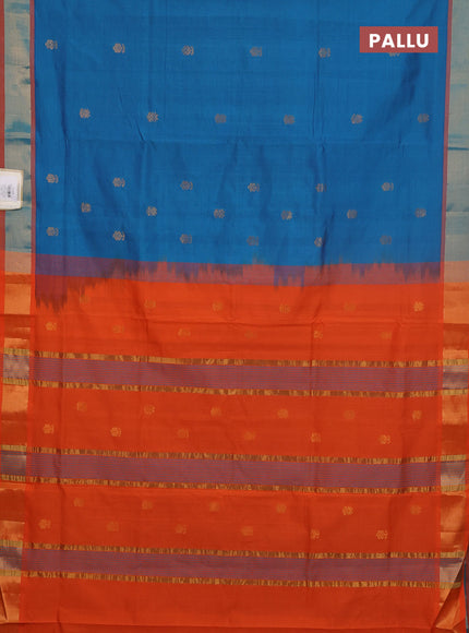 Semi silk cotton saree peacock blue and orange with allover zari woven buttas and zari woven border