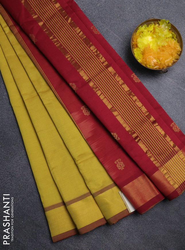 Semi silk cotton saree mustard yellow and maroon with allover zari woven buttas and zari woven border