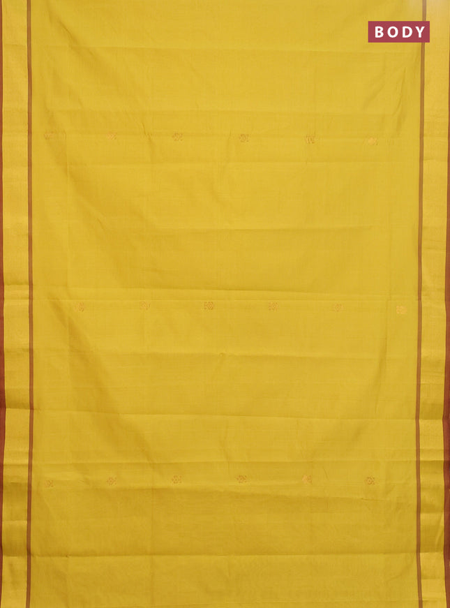 Semi silk cotton saree mustard yellow and maroon with allover zari woven buttas and zari woven border