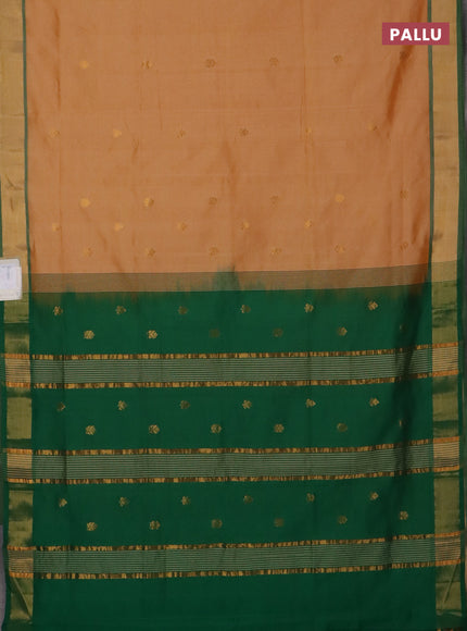 Semi silk cotton saree pale orange and green with allover zari woven buttas and zari woven border