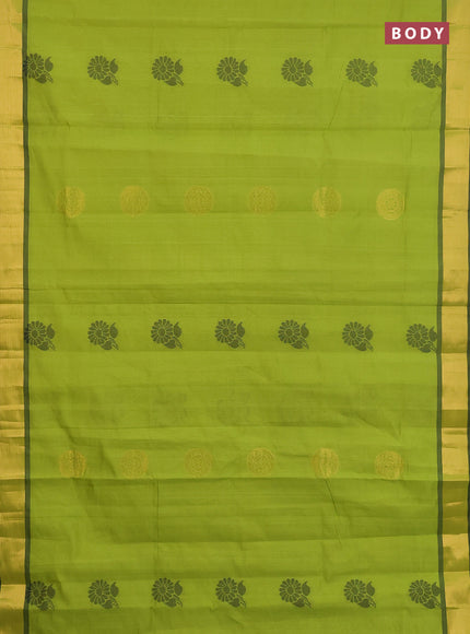 Semi silk cotton saree light green and black with zari woven buttas and zari woven border