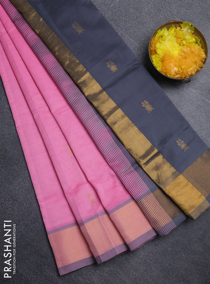 Semi silk cotton saree light pink and grey with zari woven buttas and zari woven border