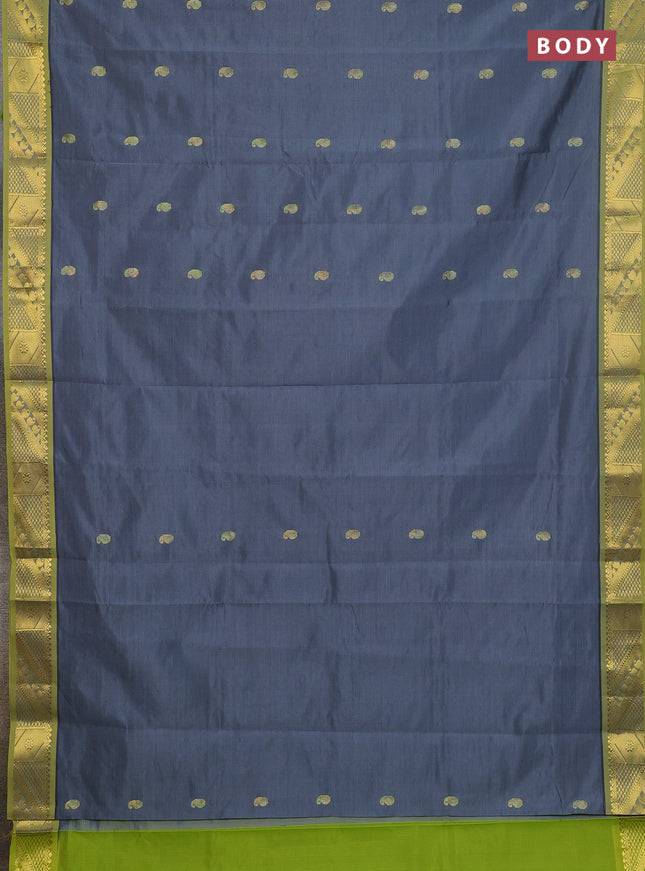 Semi silk cotton saree grey and light green with paisley zari woven buttas and zari woven border