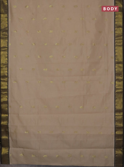 Semi silk cotton saree beige and navy blue with paisley zari woven buttas and zari woven border