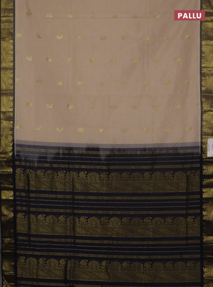 Semi silk cotton saree beige and navy blue with paisley zari woven buttas and zari woven border