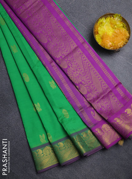 Semi silk cotton saree light green and purple with paisley zari woven buttas and zari woven border