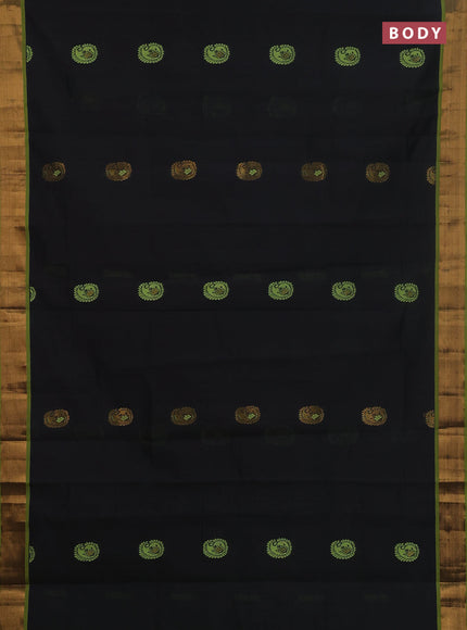 Semi silk cotton saree black and light green with thread & zari woven buttas and zari woven border