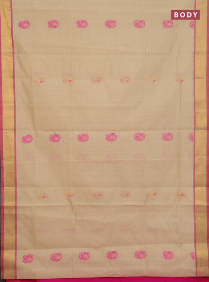 Semi silk cotton saree beige and pink with zari woven buttas and zari woven border
