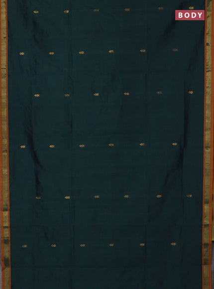 Semi silk cotton saree bottle green and mustard yellow with zari woven buttas and zari woven border