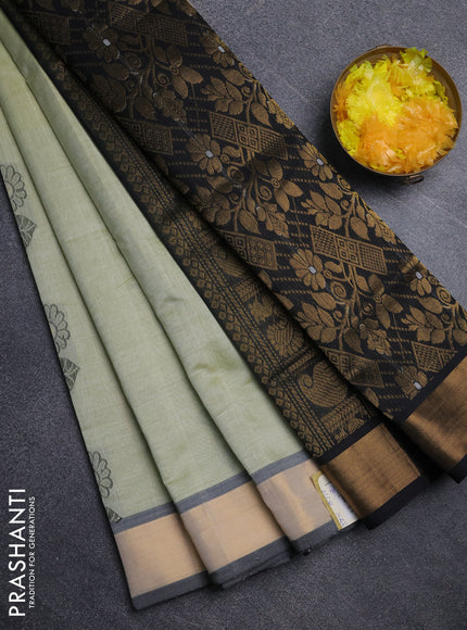 Semi silk cotton saree mild pista green and black with zari woven buttas and zari woven border