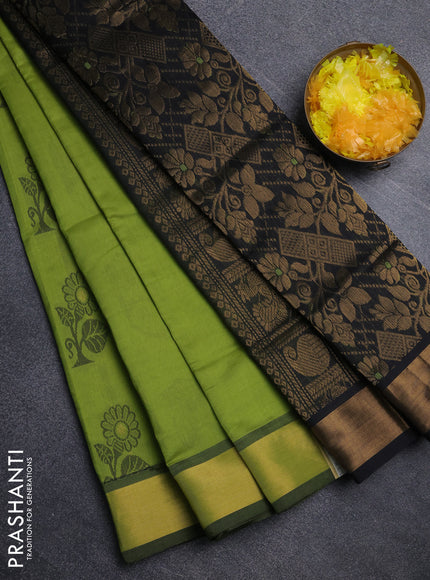 Semi silk cotton saree light green and black with zari woven buttas and zari woven border