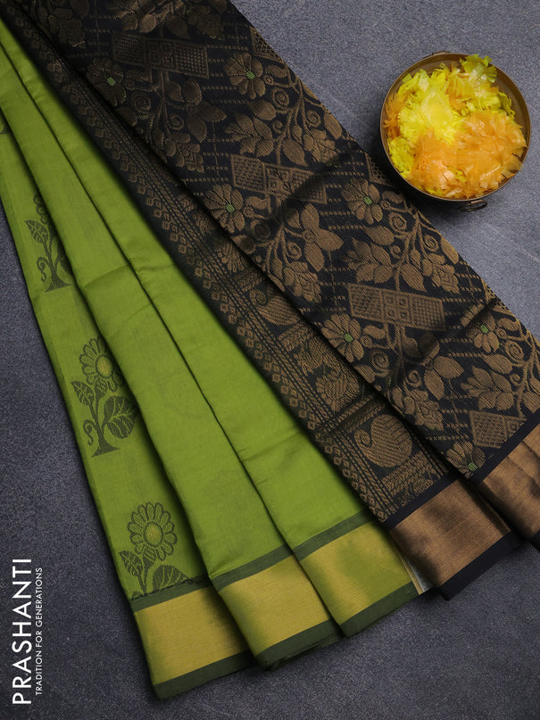 Semi silk cotton saree light green and black with zari woven buttas and zari woven border