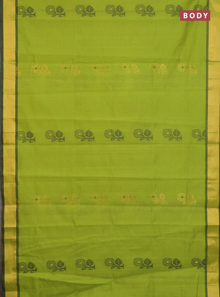 Semi silk cotton saree light green and black with zari woven buttas and zari woven border