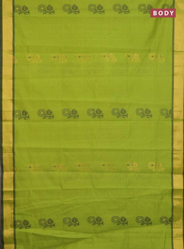 Semi silk cotton saree light green and black with zari woven buttas and zari woven border