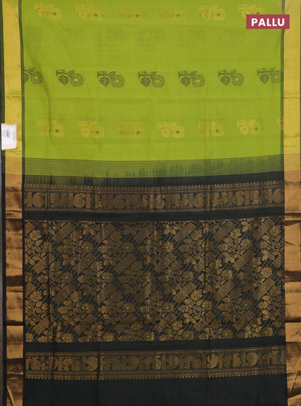 Semi silk cotton saree light green and black with zari woven buttas and zari woven border