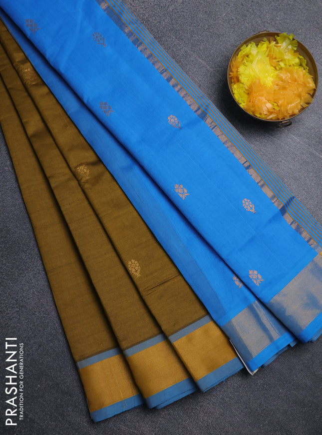 Semi silk cotton saree dark mustard and cs blue with allover zari woven buttas and zari woven border