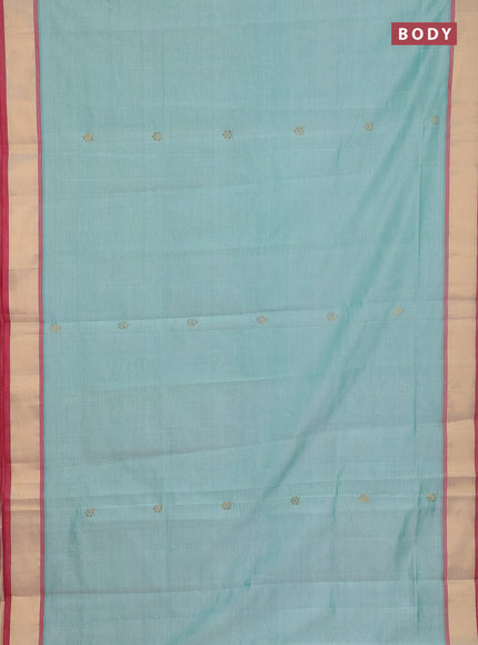 Semi silk cotton saree teal green shade and red with allover zari woven buttas and zari woven border