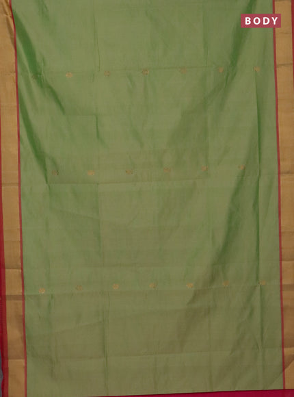 Semi silk cotton saree pastel green and pink with allover zari woven buttas and zari woven border