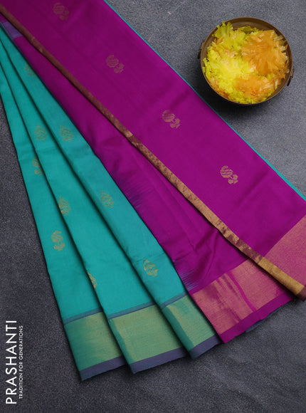 Semi silk cotton saree teal green and pink with allover zari woven buttas and zari woven border