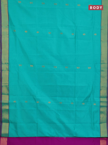 Semi silk cotton saree teal green and pink with allover zari woven buttas and zari woven border