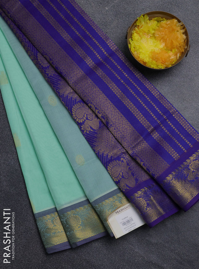 Semi silk cotton saree teal green and blue with zari woven buttas and annam zari woven