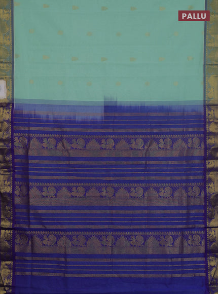 Semi silk cotton saree teal green and blue with zari woven buttas and annam zari woven