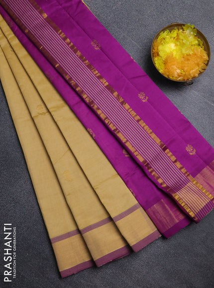 Semi silk cotton saree yellow and magenta pink with zari woven buttas and zari woven border