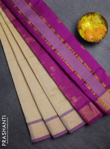 Semi silk cotton saree pale yellow and magenta pink with zari woven buttas and zari woven border
