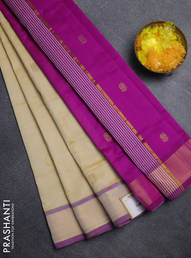Semi silk cotton saree pale yellow and pink with zari woven buttas and zari woven border