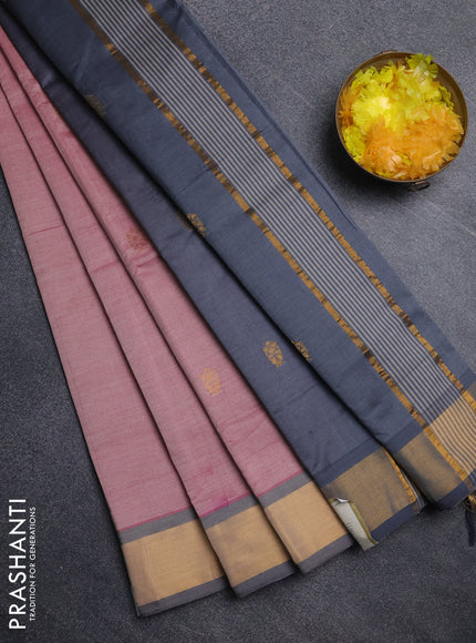 Semi silk cotton saree light pink and grey with zari woven buttas and zari woven border