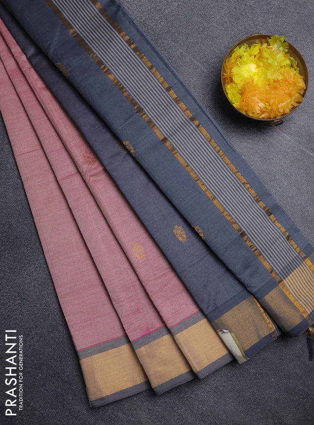 Semi silk cotton saree light pink and grey with zari woven buttas and zari woven border