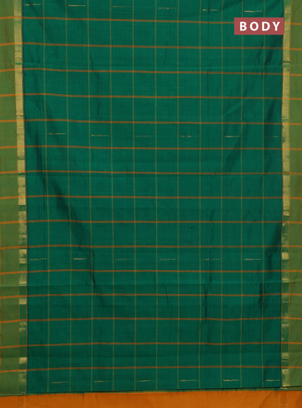 Semi silk cotton saree green and mustard yellow with allover thread checks & zari buttas and zari woven simple border