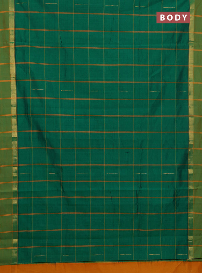 Semi silk cotton saree green and mustard yellow with allover thread checks & zari buttas and zari woven simple border
