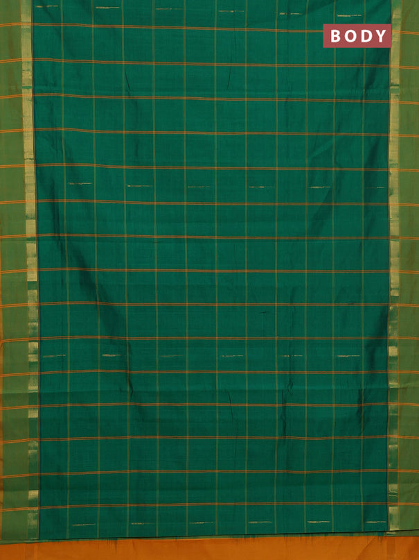 Semi silk cotton saree green and mustard yellow with allover thread checks & zari buttas and zari woven simple border