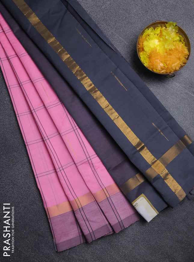 Semi silk cotton saree light pink and grey with allover thread checks & zari buttas and zari woven simple border