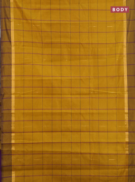 Semi silk cotton saree dark mustard and purple with allover thread checks & zari buttas and zari woven simple border