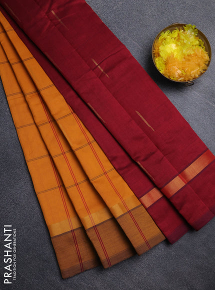 Semi silk cotton saree mustard yellow and maroon with allover thread checks & zari buttas and zari woven simple border